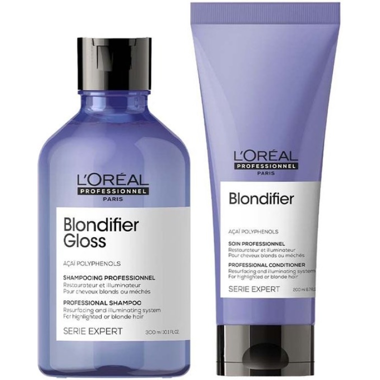 L’Oréal Professionnel Serie Expert Blondifier Gloss shampoo en conditioner zijn speciaal ontwikkeld voor blond, ontkleurd en gehighlight haar dat extra verzorging en glans nodig heeft. Deze professionele formule helpt de natuurlijke schoonheid van blond haar te versterken en geeft het haar een heldere, frisse uitstraling. De shampoo reinigt het haar op milde wijze en verwijdert onzuiverheden zonder het haar te verzwaren. Tegelijkertijd helpt het de glans van blond haar te verbeteren en maakt het de haarkleur levendiger en stralender. Het haar voelt na gebruik licht, fris en verzorgd aan. De conditioner biedt een intensieve verzorging die het haar verzacht en helpt om de haarvezel te herstellen. Het maakt het haar makkelijker doorkambaar en vermindert droogheid en beschadiging. Hierdoor krijgt het haar een zijdezachte textuur en een gezonde glans. Dankzij de verrijking met verzorgende ingrediënten helpt deze lijn het haar te beschermen tegen dagelijkse invloeden zoals styling en externe factoren. Het haar blijft soepel, sterk en beter handelbaar. Deze combinatie is ideaal voor dagelijks gebruik en geschikt voor alle types blond haar, zowel natuurlijk als gekleurd. Bij regelmatig gebruik wordt het haar zichtbaar zachter, glanzender en beter verzorgd, met een professioneel resultaat. Flaka.be Professional Haircare Distribution