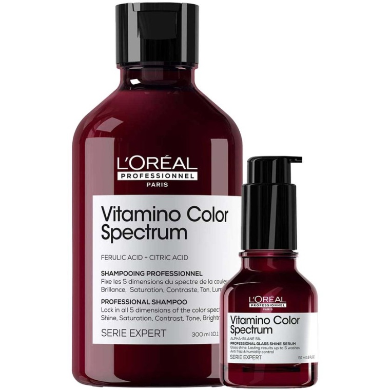 L'Oréal Professionnel Vitamino Color Spectrum Shampoo + Serum Voordeelset combineert kleurbehoud en glans in één routine. De shampoo reinigt het haar grondig en helpt de kleur tot 100 dagen* te vergrendelen, terwijl het Glass Shine Serum zorgt voor een direct glasglanseffect tot 10 wasbeurten*. Dankzij de verrijking met ferulinezuur, citroenzuur en alpha-silane wordt het haar intens verzorgd, en het Glass Shine Serum beschermd tegen UV-schade en hitte tot 230°C*. flaka.be