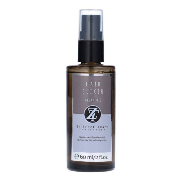 ZENZTHERAPY Hair Elixir Argan Oil is een luxe professionele haarolie die het haar intens voedt, beschermt en een prachtige gezonde glans geeft zonder het haar vet of zwaar te maken. Deze exclusieve formule met hoogwaardige arganolie helpt droog, beschadigd en pluizig haar opnieuw zijdezacht en soepel aan te laten voelen. Dankzij de lichte maar krachtige samenstelling wordt het haar direct gladder, beter handelbaar en zichtbaar gezonder. De olie helpt gespleten haarpunten te verminderen terwijl het tegelijkertijd bescherming biedt tegen hitte, styling en dagelijkse invloeden van buitenaf. ZENZTHERAPY Hair Elixir Argan Oil trekt snel in het haar en laat een luxe salonfinish achter met een natuurlijke glans en een zijdezachte touch. Perfect voor zowel dagelijks gebruik als professionele styling. Voordelen van ZENZTHERAPY Hair Elixir Argan Oil: • Intens voedende arganolie formule • Geeft directe glans en zachtheid • Vermindert pluizig haar • Beschermt tegen hitte en styling • Maakt het haar beter handelbaar • Verzwaart het haar niet • Helpt droge punten herstellen • Luxe professionele salonkwaliteit Perfect voor: • Droog en beschadigd haar • Pluizig haar • Gekleurd of chemisch behandeld haar • Extra glans en zachtheid • Dagelijkse bescherming • Professionele styling routines Gebruik: Breng 1 à 2 pompjes aan op handdoekdroog of droog haar. Verdeel vooral over lengtes en punten. Niet uitspoelen. Kan dagelijks gebruikt worden voor extra verzorging en glans. Waarom bestellen bij Flaka.be? Bij Flaka.be koop je originele professionele ZENZTHERAPY producten die geselecteerd zijn door ervaren haarspecialisten. Ontdek premium haarverzorging, snelle levering en exclusieve salonkwaliteit voor thuisgebruik. SEO Titel: ZENZTHERAPY Hair Elixir Argan Oil 60ml | Professionele Haarolie | Flaka.be Meta Beschrijving: Koop ZENZTHERAPY Hair Elixir Argan Oil 60ml bij Flaka.be. Luxe arganolie voor glans, voeding, bescherming en pluisvrij haar. SEO Zoekwoorden: ZENZTHERAPY Argan Oil Hair Elixir haarolie Professionele haarolie Arganolie voor haar Glans haarolie Anti pluis haarolie ZENZTHERAPY haarverzorging Luxe haarolie Beschadigd haar herstellen Flaka.be ZENZTHERAPY