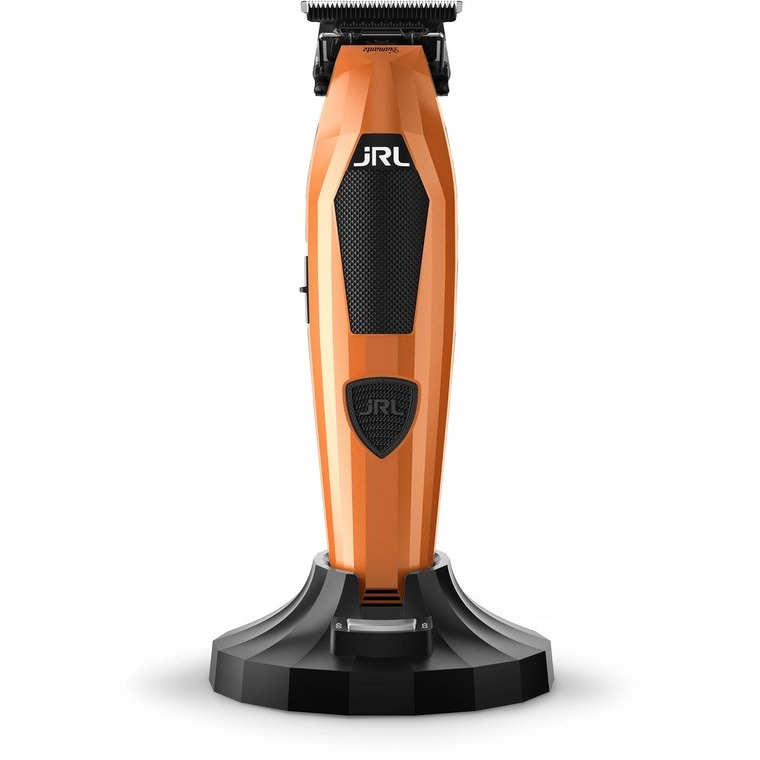 JRL Diamante 2025T Trimmer Orange – Professionele Precisie voor Strakke Details De JRL Diamante 2025T Trimmer Orange is ontwikkeld voor professionele barbers en kappers die maximale precisie, kracht en controle verwachten. De opvallende oranje uitvoering combineert een premium design met krachtige technologie voor contouren, baardlijnen, finishing en nauwkeurig detailwerk. De brushless motor draait op 8.200 RPM en levert constante prestaties, ook bij dikker haar of stugge baardgroei. Dankzij de slimme motortechnologie blijft de trimmer soepel werken zonder merkbaar krachtverlies. Belangrijkste voordelen - Professionele 8.200 RPM brushless motor - Geschikt voor contouren, line-ups en detailwerk - EZ-Gap verstelbaar voor zeer korte snijlengtes - Smart-Clip technologie voor constante prestaties - Ultra-stille werking - LED-statusindicatie - Reset IQ™ charging dock - 5 opzetkammen inbegrepen - Stijlvolle Orange-uitvoering - Ontwikkeld voor intensief professioneel gebruik Precisie met EZ-Gap technologie De JRL Diamante Trimmer is uitgerust met een professioneel EZ-Gap bladsysteem waarmee je het mes zeer nauwkeurig kunt afstellen. Hierdoor is de trimmer perfect voor: - haarlijnen - baardcontouren - nekafwerking - detailwerk rond oren en slapen - finishing bij fades - creatieve barbertechnieken 42 mm precisieblad De Diamante 2025T beschikt over een breed precisieblad van ongeveer 42 mm, waardoor je snel maar gecontroleerd kunt werken. Het Parallel Motion Blade is ontworpen voor ultrafijne details en bijna-zero-gap prestaties. Smart-Clip Constant Speed Technology De Smart-Clip technologie helpt de motor automatisch kracht bij te zetten wanneer er extra weerstand ontstaat. Hierdoor blijft de snijsnelheid stabiel en vermindert de kans op trekken of vastlopen tijdens het trimmen. Batterij en gebruiksduur De JRL Diamante 2025T beschikt over een 2000 mAh lithium-ion batterij. De trimmer biedt een lange draadloze gebruiksduur en is ontwikkeld voor professioneel gebruik tijdens drukke werkdagen. Slimme LED-indicatie Het verlichte JRL-logo geeft visuele informatie over batterij- en stroomstatus. Hierdoor kan je tijdens het werken snel controleren hoeveel capaciteit er nog beschikbaar is. Wat zit er in de verpakking? De professionele set bevat onder andere: - JRL Diamante 2025T Trimmer Orange - Reset IQ™ Charging Dock - 5 opzetkammen - EZ-Gap adjustment tool - blade protector - reinigingsborstel - smeerolie - voedingsadapter Premium webshoptekst De JRL Diamante 2025T Trimmer Orange combineert professionele kracht met extreme precisie. De 8.200 RPM brushless motor, EZ-Gap technologie, het brede precisieblad en de slimme LED-indicatie maken deze trimmer ideaal voor barbers die elke lijn en contour perfect willen afwerken. De opvallende oranje afwerking geeft de trimmer bovendien een unieke premium uitstraling op iedere barberstation. Verkrijgbaar bij Flaka.be.